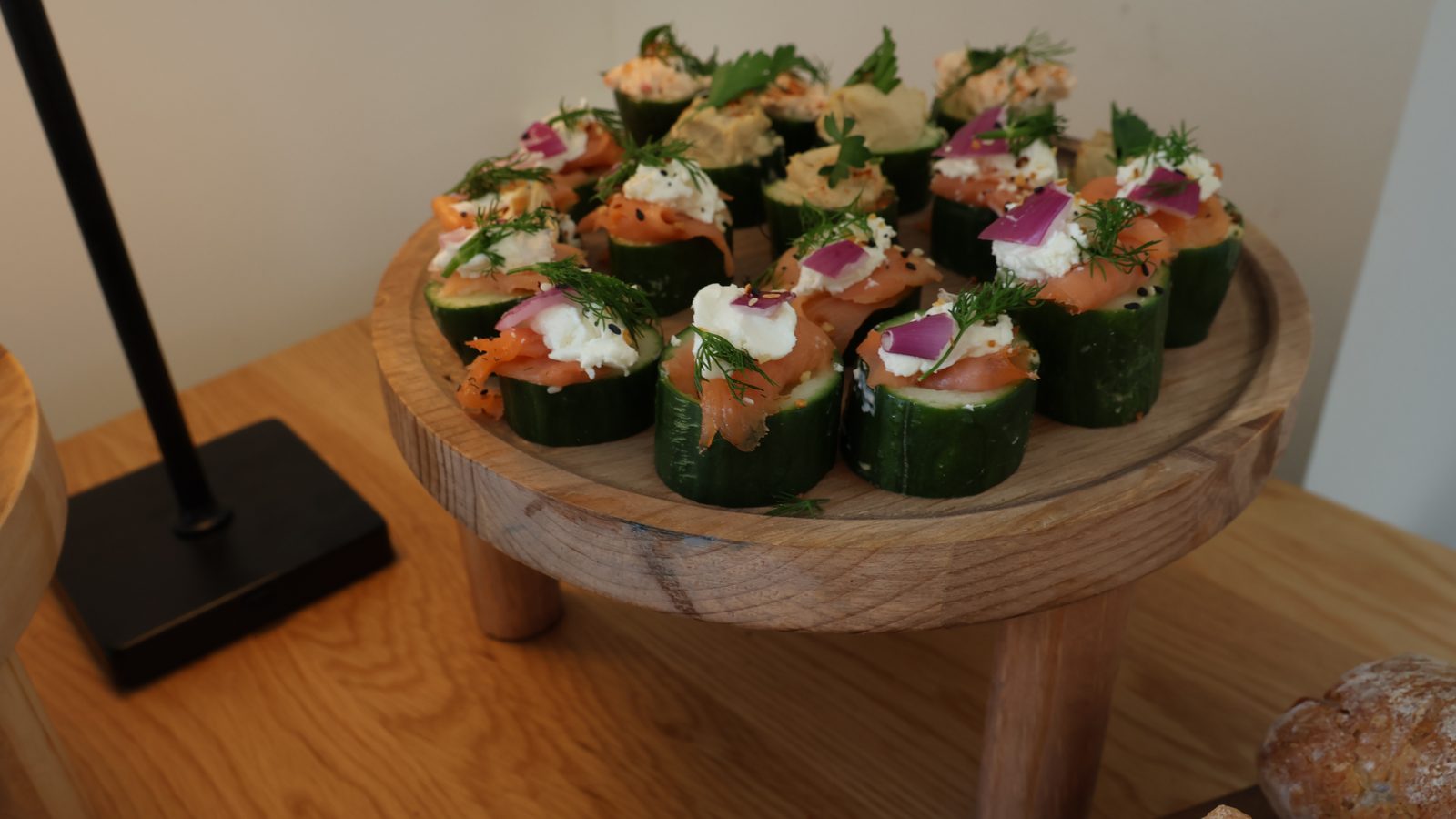 cucumber canapés on a raised stand