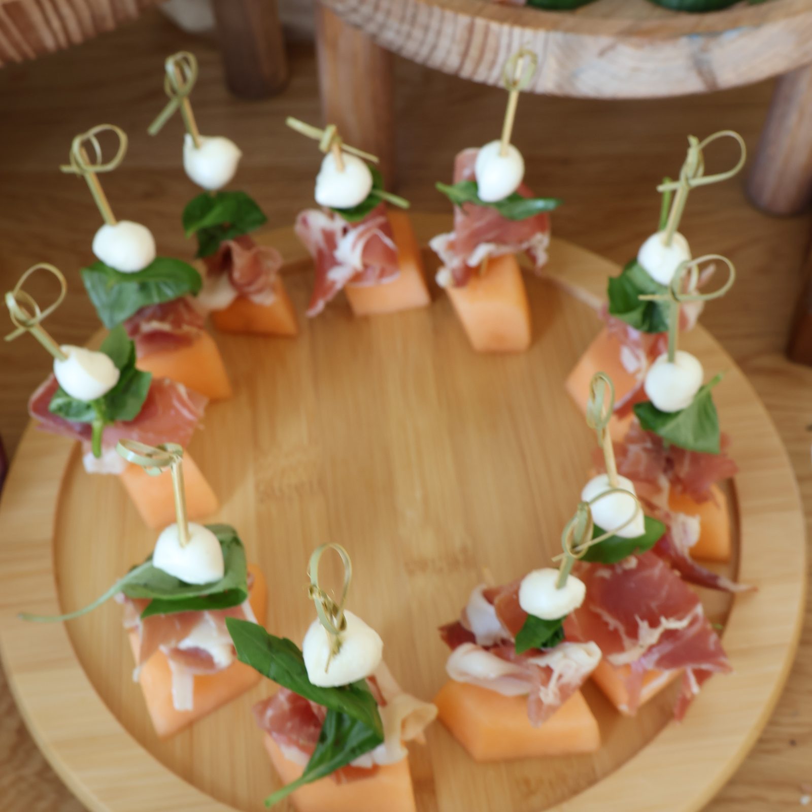 prosciutto e melone — cantaloupe, prosciutto, basil, honey to dip
